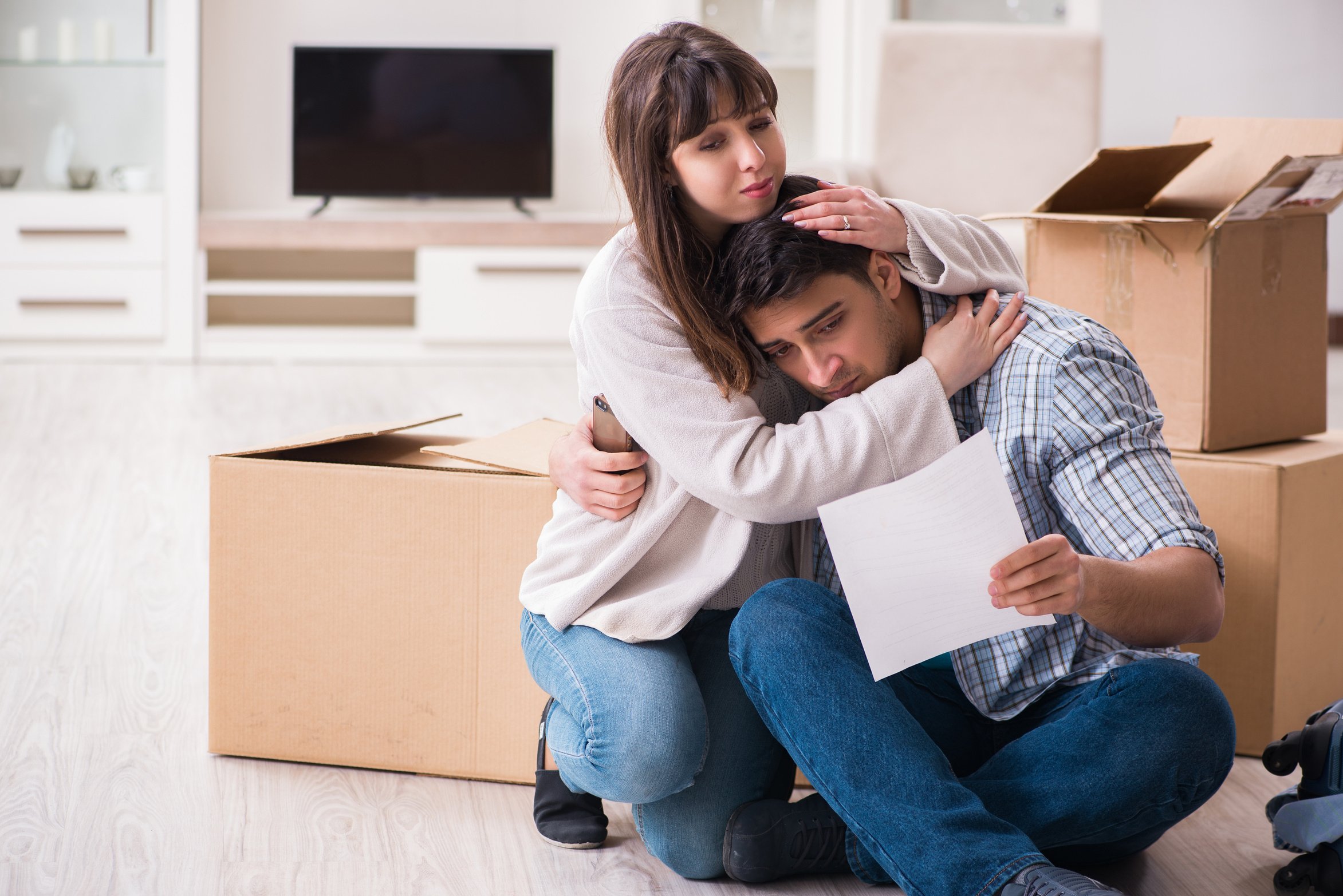 Young Couple Receiving Foreclosure Notice Letter